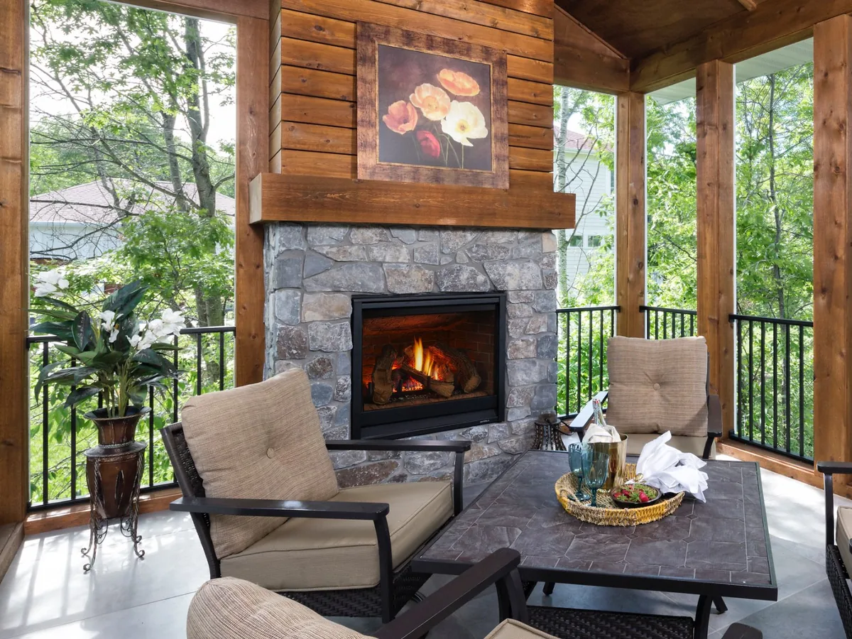 Heat & Glo 6000CL outdoor gas fireplace on a covered porch with patio seating